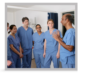A group of clinicians having a discussion.